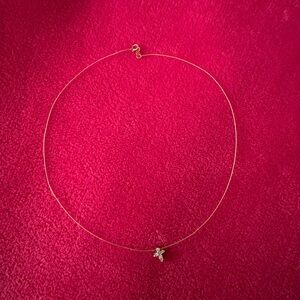 14 karat gold chain with tiny diamond cross.